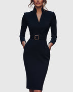 Model wearing mock wrap midi dress, standing pose