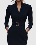 Side view of midi dress with structured shoulders