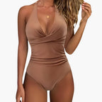 High-cut leg opening detail on one piece swimsuit