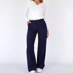 Close-up of pressed front seam detail on trousers