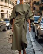 Midi dress styled with belt, side profile showing kimono sleeve detail