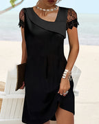Back view of black mini dress with lace sleeves