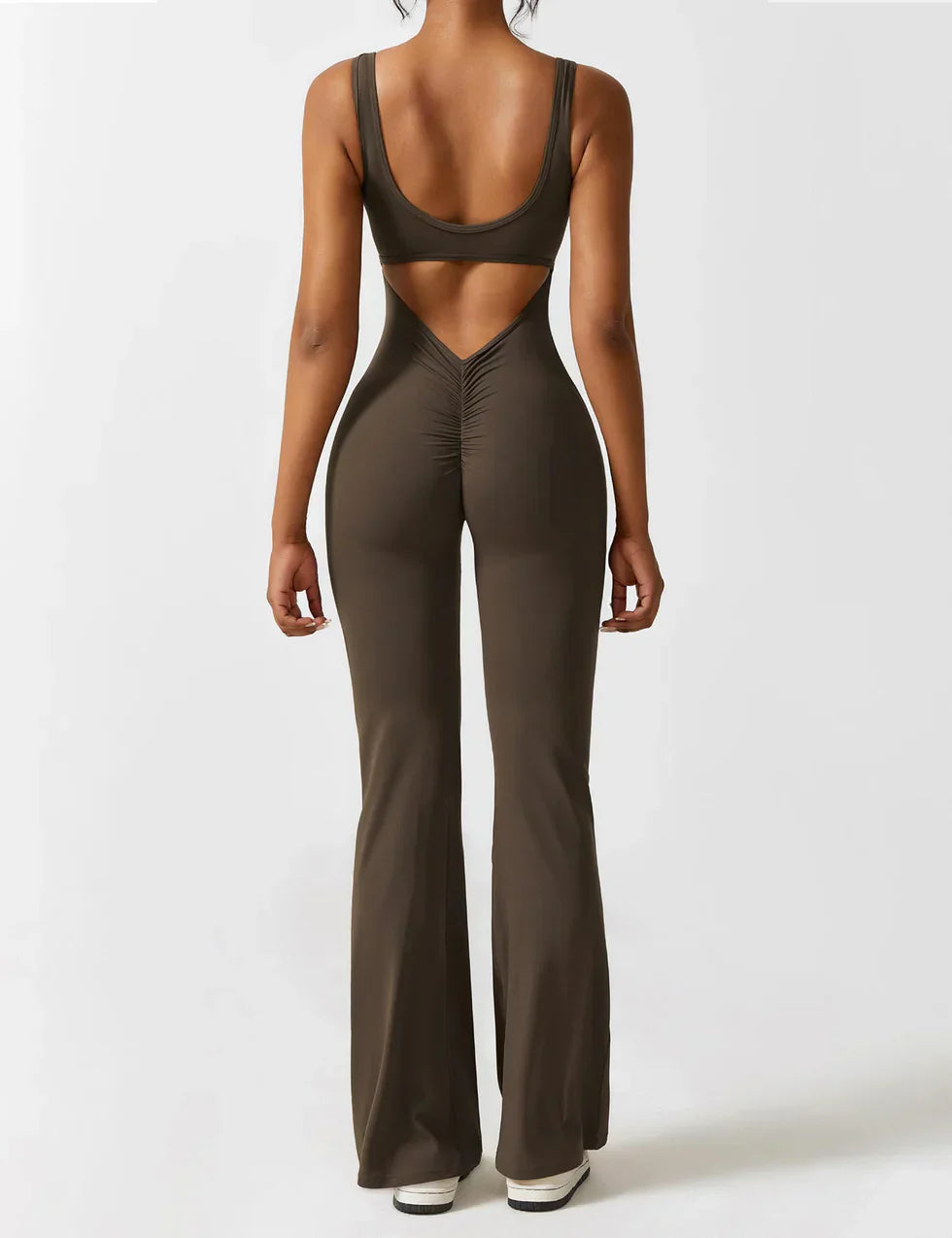 Model in jumpsuit, three-quarter front pose