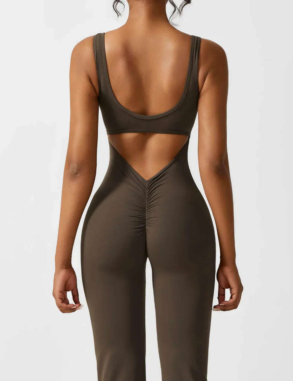 Model movement in sleeveless jumpsuit, active pose