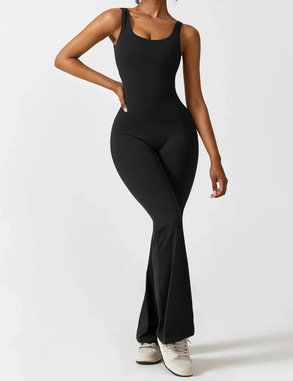 Flare leg trousers on jumpsuit, side angle