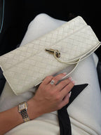 Clutch worn as handheld evening bag