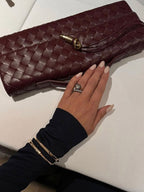 Interior pocket detail of leather clutch
