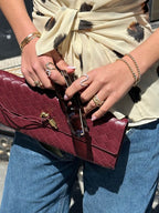 Gold button and leather texture combination detail