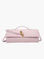 Clutch worn as crossbody bag with detachable strap