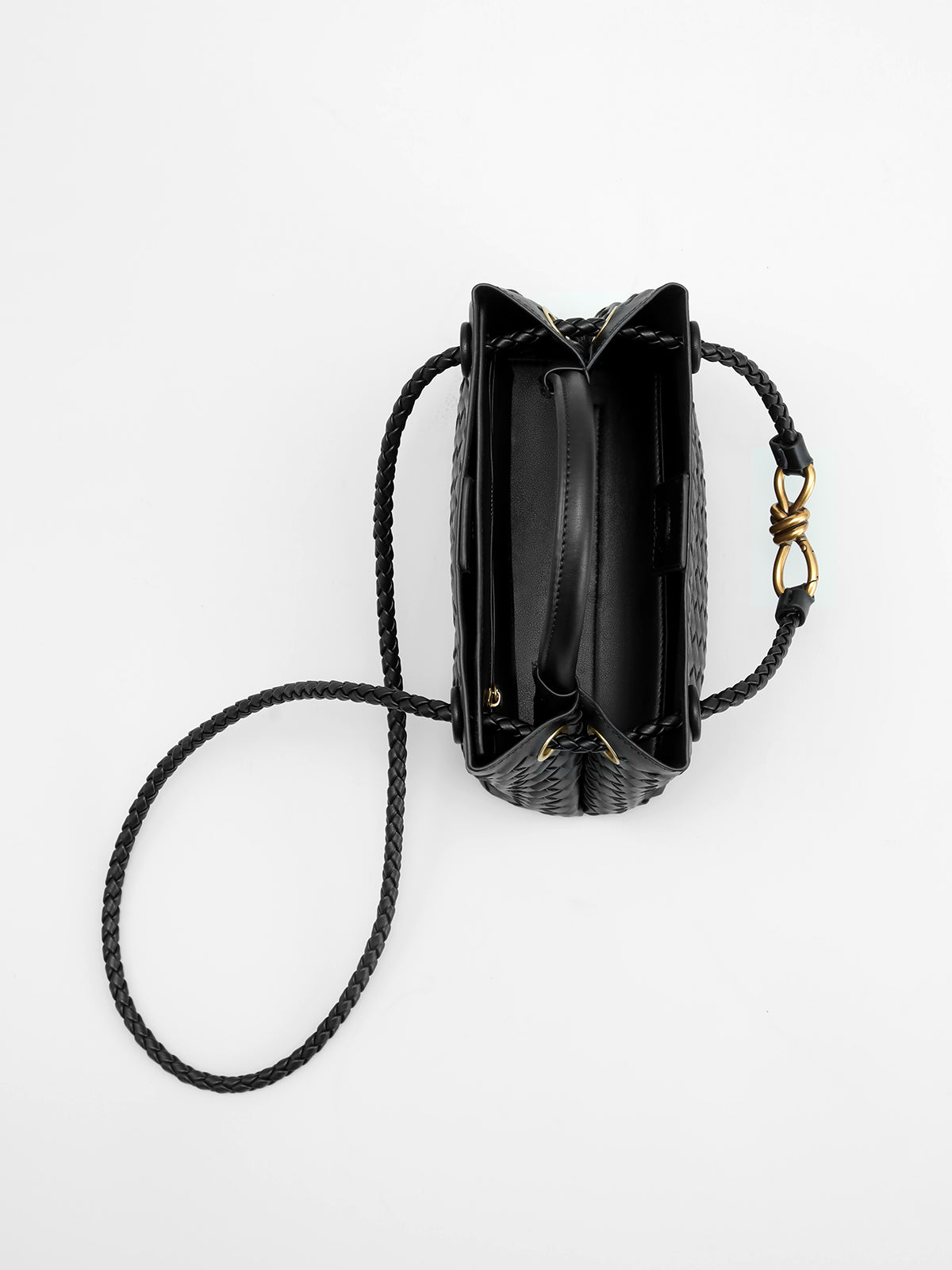 Structured tote styled as handbag with handles and interior detail