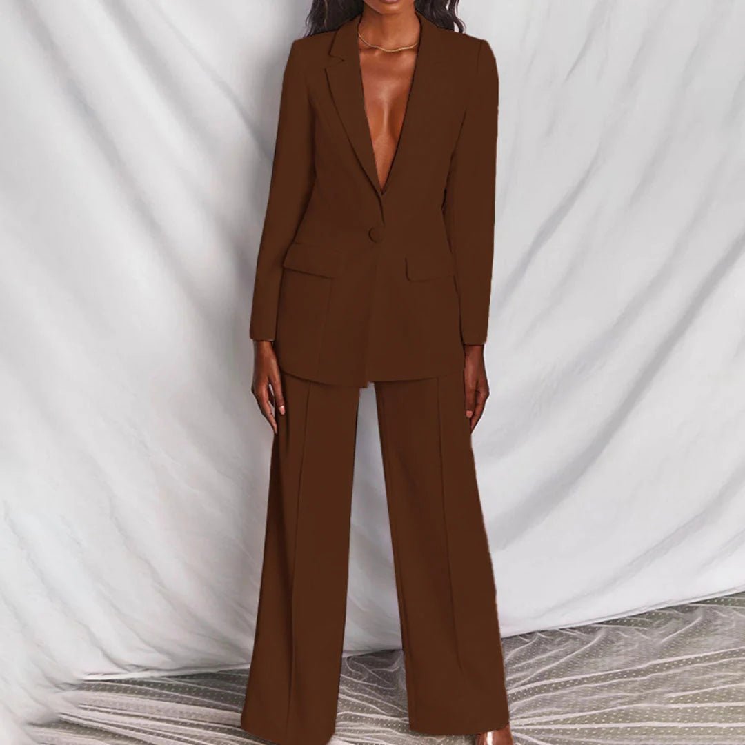 Blazer detail showing single-button closure and structured waist