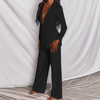 Full outfit styled view of blush pink suit ensemble