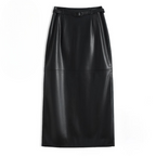 Close-up of matching leather belt detail on waist