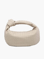 Women's cream woven shoulder bag with knotted handle, front view