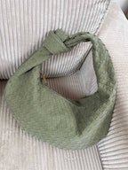 Knotted handle knot detail and stitching
