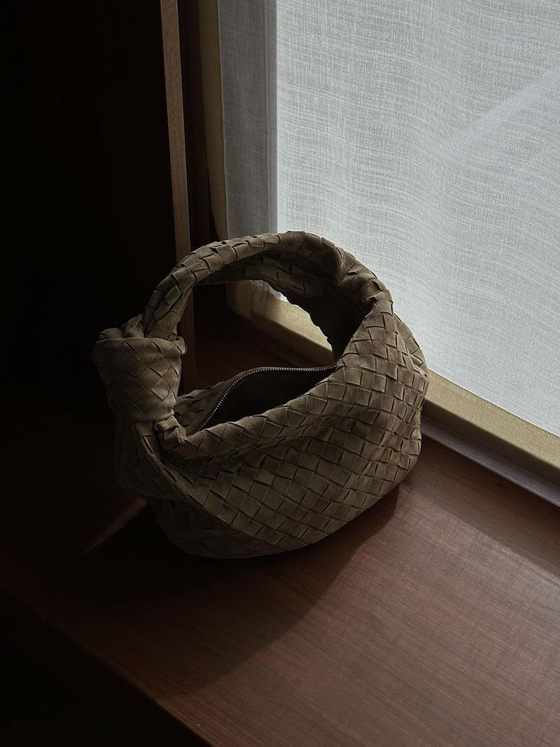 Woven bag from back angle on model