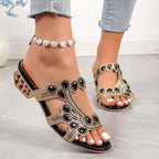 Overhead flat lay of pair of embellished heart sandals