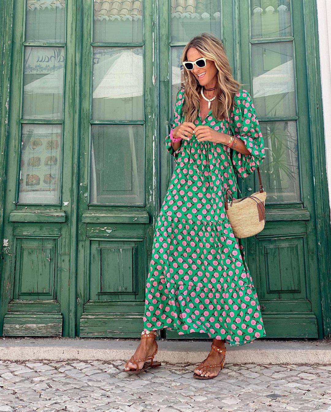 Back view of maxi dress showing tiered hem detail