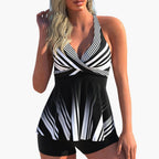 Close-up of leopard print and tropical leaf pattern on tankini fabric