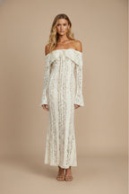 Ivory lace off-shoulder maxi dress with bell sleeves on model, front view