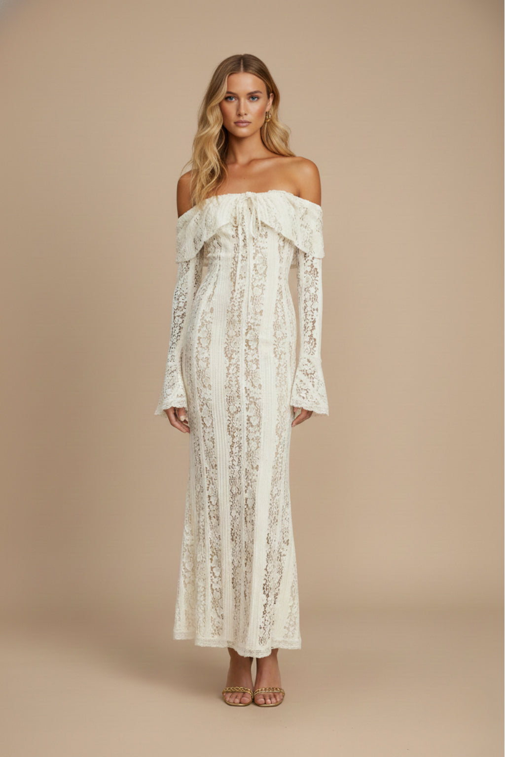 Ivory lace off-shoulder maxi dress with bell sleeves on model, front view