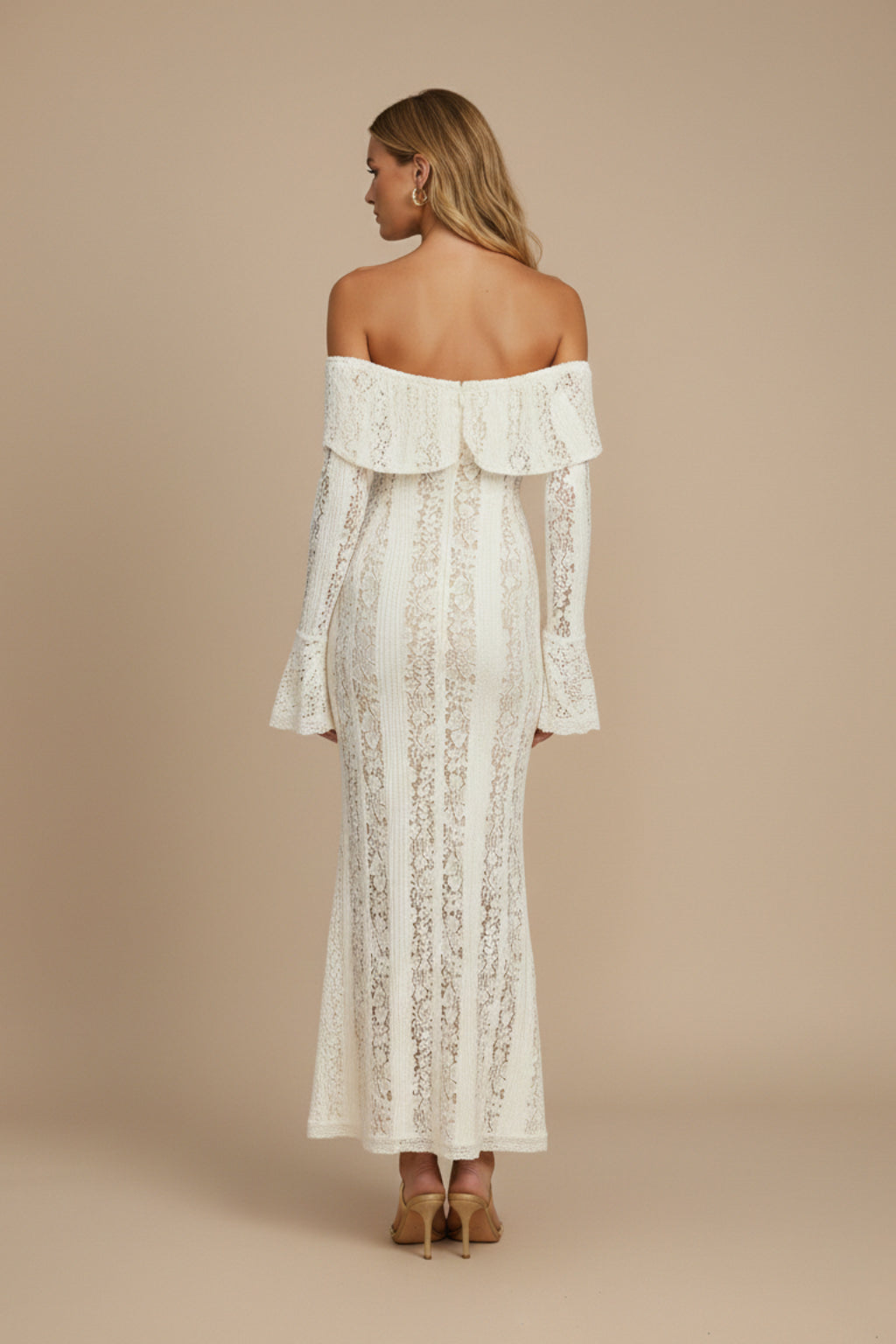 Close-up of intricate lace detailing on bodice and off-shoulder neckline