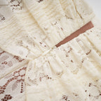 Model in motion showing flared hem and bell sleeve movement