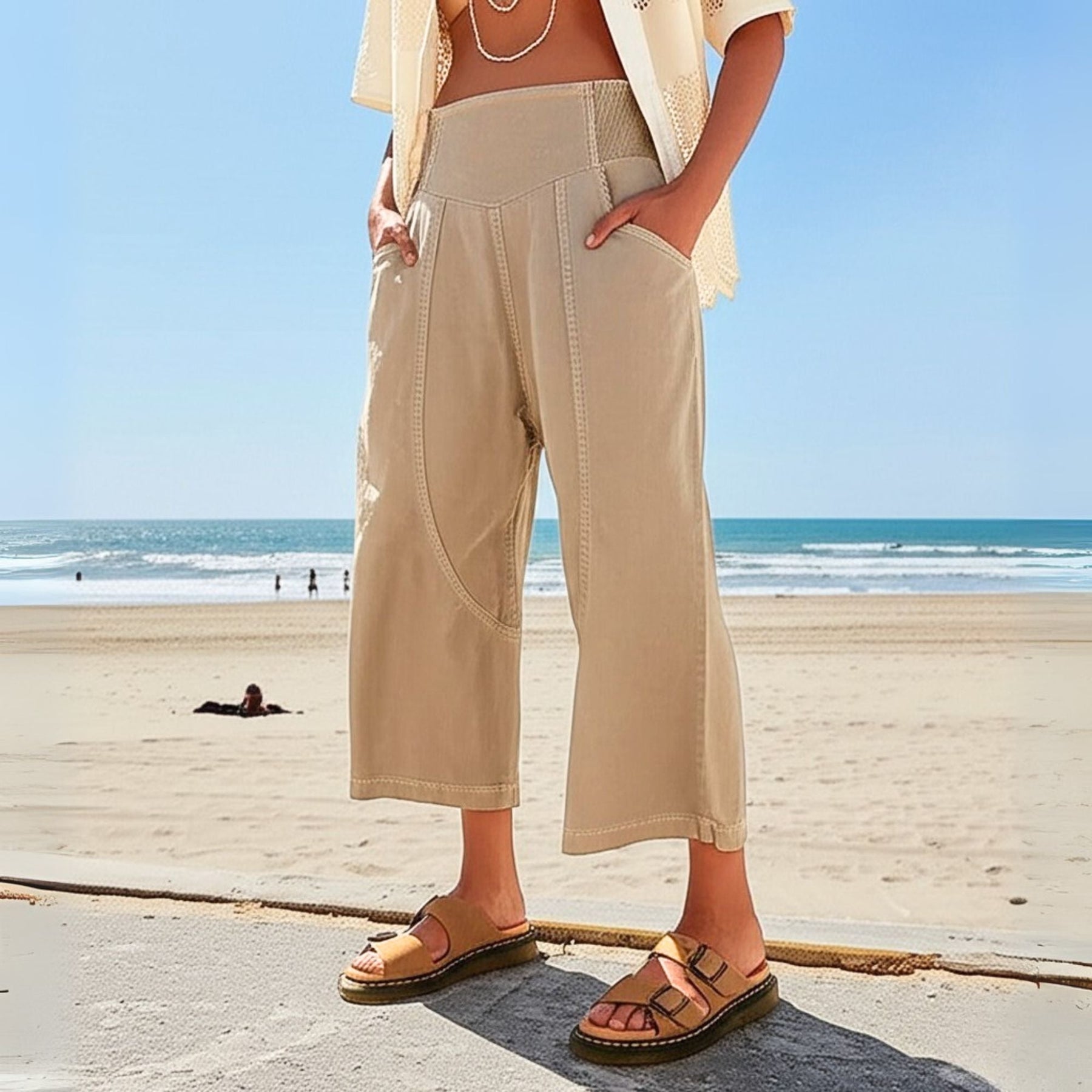 Front pocket detail on cropped trousers