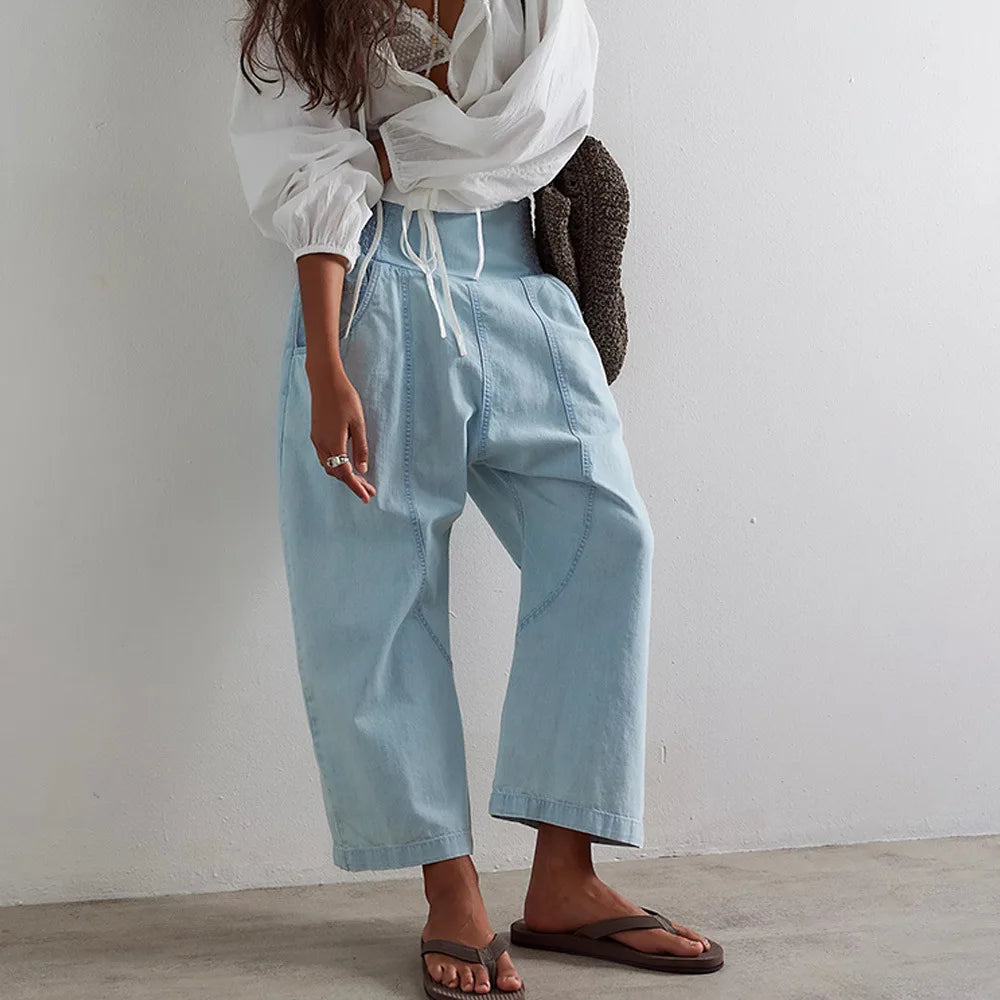 Model styling trousers with casual top