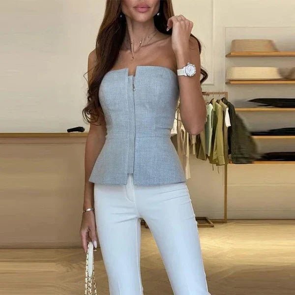 Light blue strapless corset top with front zip, displayed on mannequin