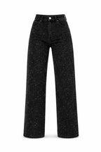 Detail shot of waistband and high rise fit on jeans