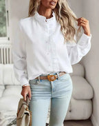 Model wearing blouse, standing pose showing full length silhouette