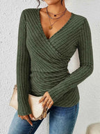 Close-up of ribbed knit fabric texture and wrap front tie