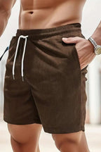 Angled front view showing shorts fit and length