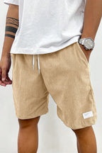 Back view of corduroy shorts with drawstring detail