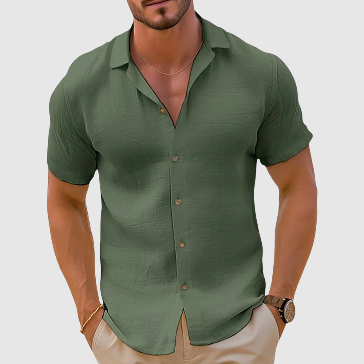 Model wearing shirt unbuttoned over plain tee