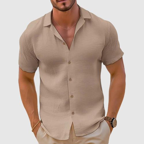 Men's linen short sleeve shirt flat lay on neutral background