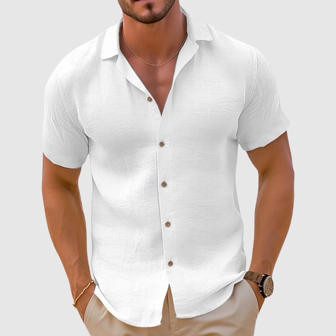 Side profile of model in linen short sleeve shirt