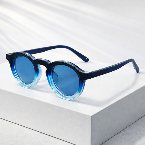 Model wearing round frame sunglasses, direct front pose