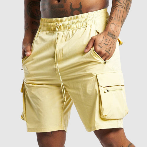 Model wearing black cargo shorts, standing pose showing relaxed fit