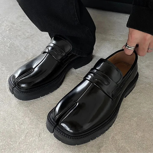 Black patent leather split toe loafer with chunky sole, displayed front view
