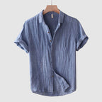 Model wearing crinkle linen shirt, standing pose