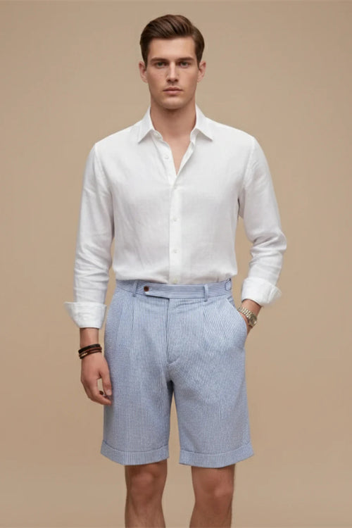Model wearing striped chino shorts, standing pose