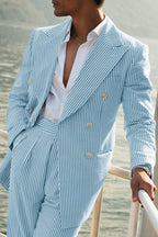 Model wearing striped seersucker suit, standing pose from front