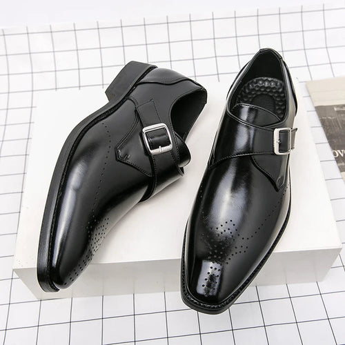 Side profile of monk strap shoe showing strap and buckle detail