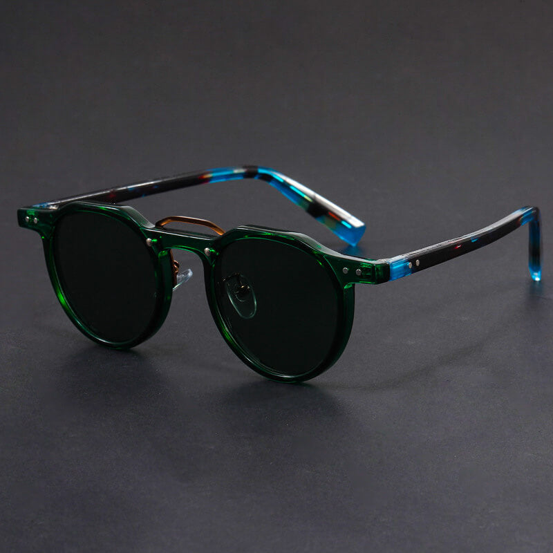 Close-up of tortoiseshell arm detail and lens tint on round sunglasses