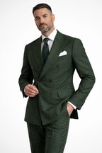 Side profile view of green suit jacket and trousers