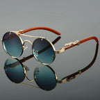 Man wearing round frame sunglasses outdoors in natural light