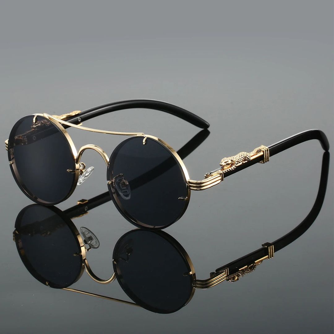 Men's round frame sunglasses with gold-toned metal frames and dark lenses, front view