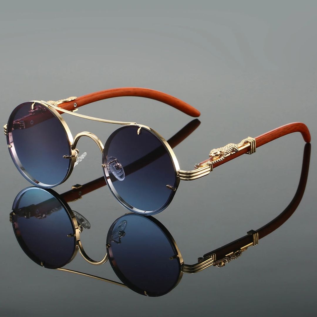 Close-up of gold-toned frame and dark gradient lens with anti-reflective coating